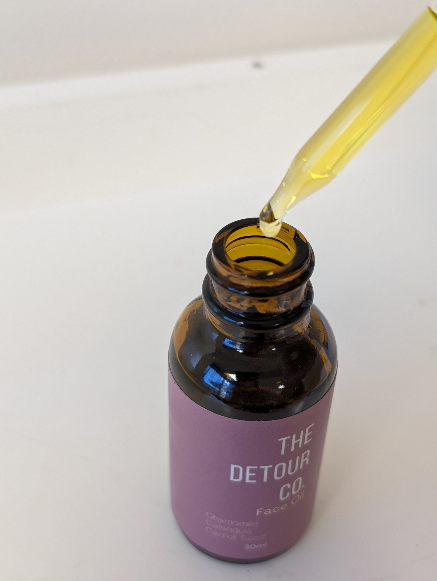 face oil with chamomile, calendula, carrot seed, repair mature skin